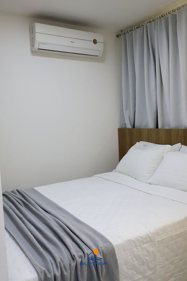 Apê frente jardim com quarto privativo