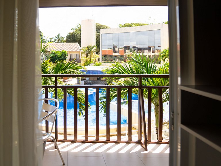 Apartamento climatizado con vista a la piscina para la famil