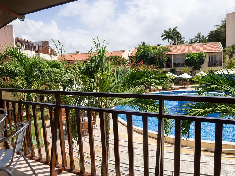 Apartamento climatizado con vista a la piscina para la famil